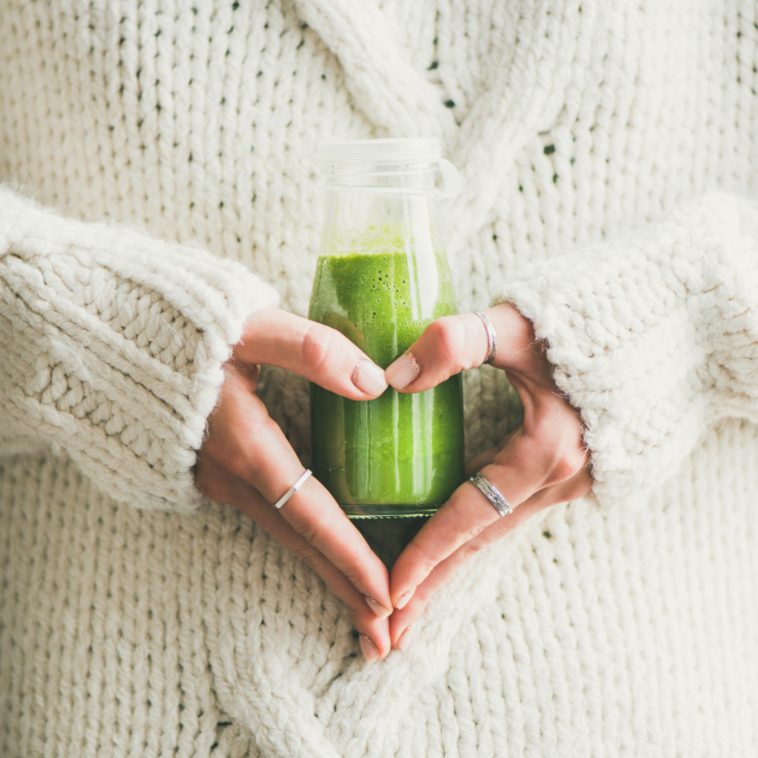 woman with health green drink